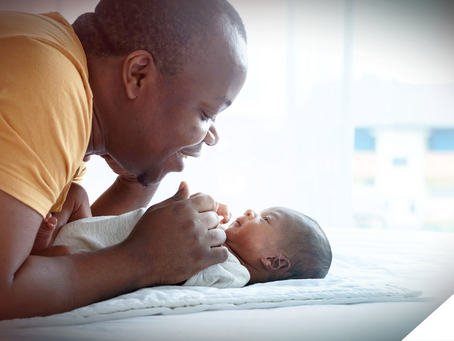 human connection between a father and infant child