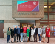 Group photo of Itai Dinour, the Einhorn family, the Einhorn Collaborative team, and Cornell staff and students in front of the Einhorn Center.