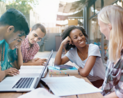 Group of diverse students studying together