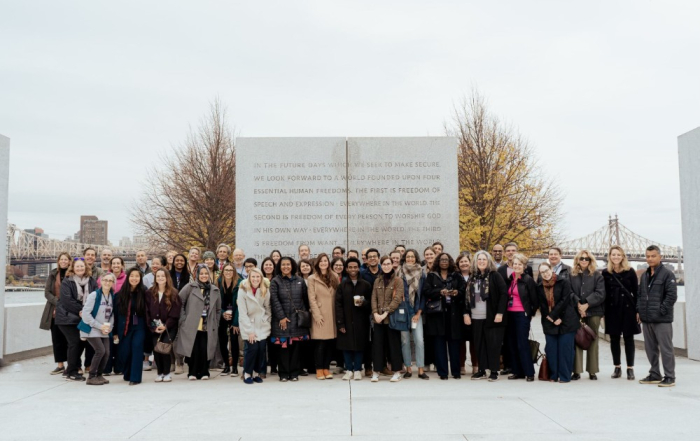 Jenn Hoos Rothberg and a group of people at four freedoms park